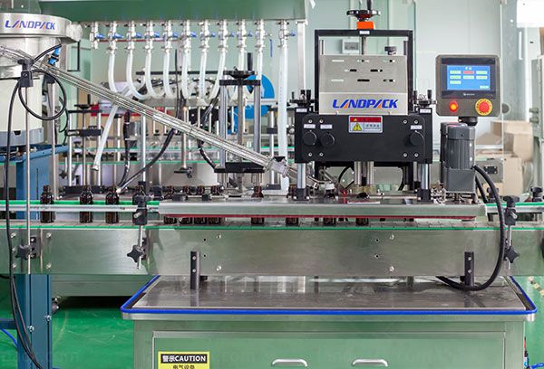 automatic bottle filling capping labeling and sealing machine