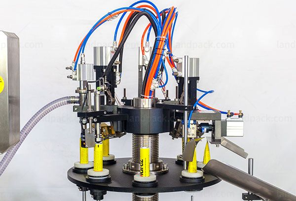 Plastic tube sealing machine