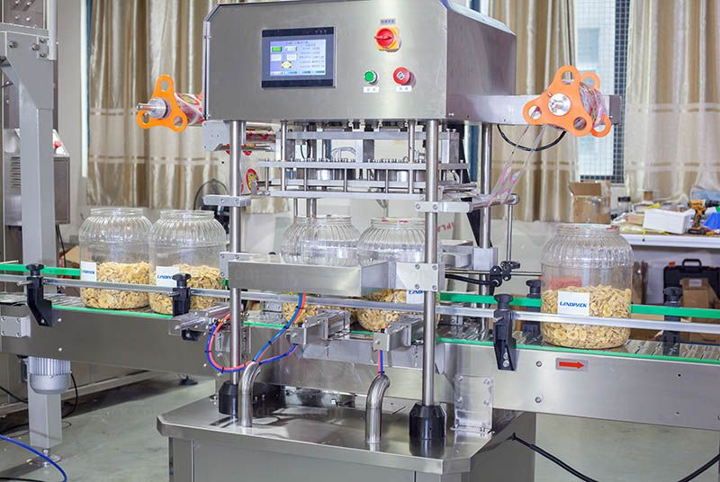 Automatic Gummy Bottle Filling Machine with Aluminum Foil Sealing Labeling Machine Automatic Gummy Bottle Filling Machine with Aluminum Foil Sealing Labeling Machine